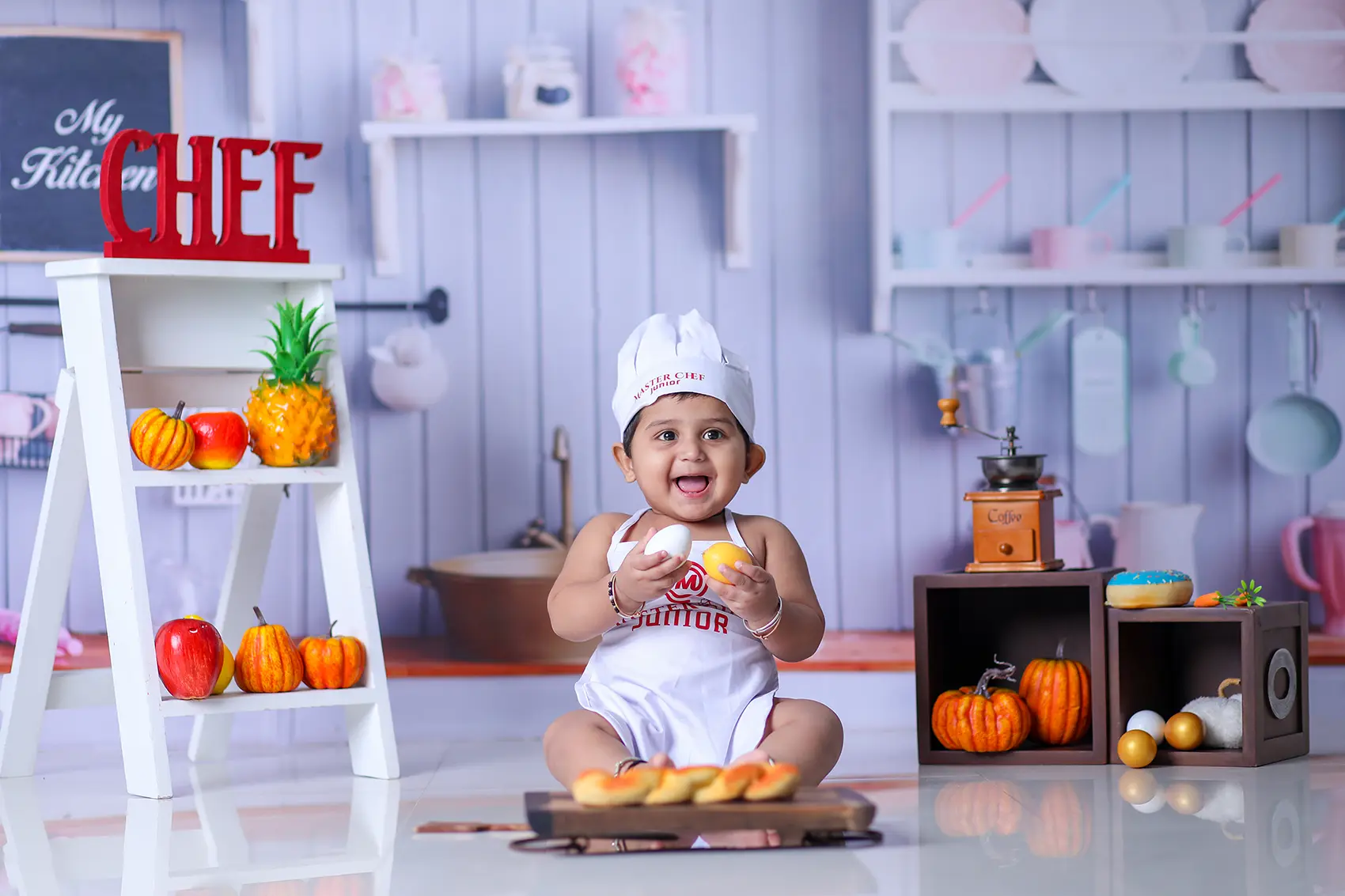 https://dx21q3b76hjv4.cloudfront.net/images/new/themes/my-kitchen/chef-theme-baby-photoshoot.webp